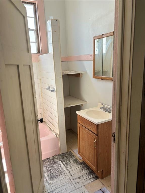 bathroom with vanity and tile patterned floors