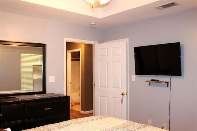 bedroom featuring ensuite bathroom