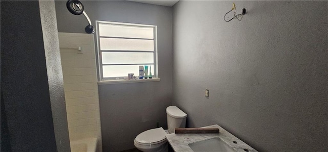 full bathroom with vanity, shower / bathing tub combination, and toilet