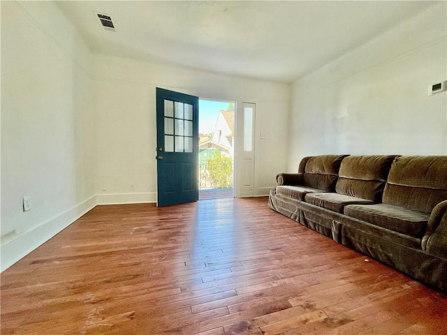 living room featuring wood-type flooring