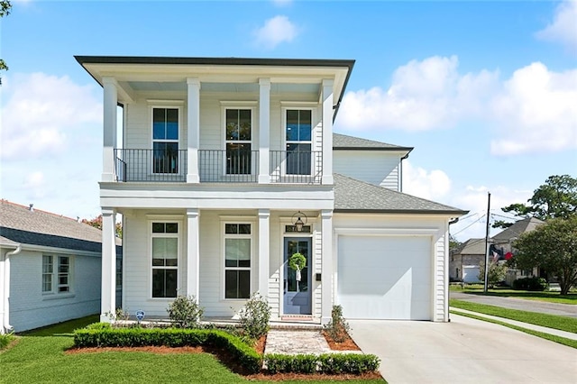 view of front of house with a balcony, covered porch, and a front lawn