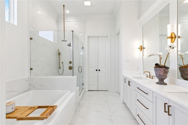 bathroom featuring ornamental molding, vanity, and independent shower and bath