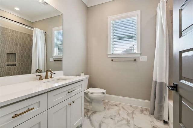 full bathroom featuring vanity, shower / bath combination with curtain, and toilet