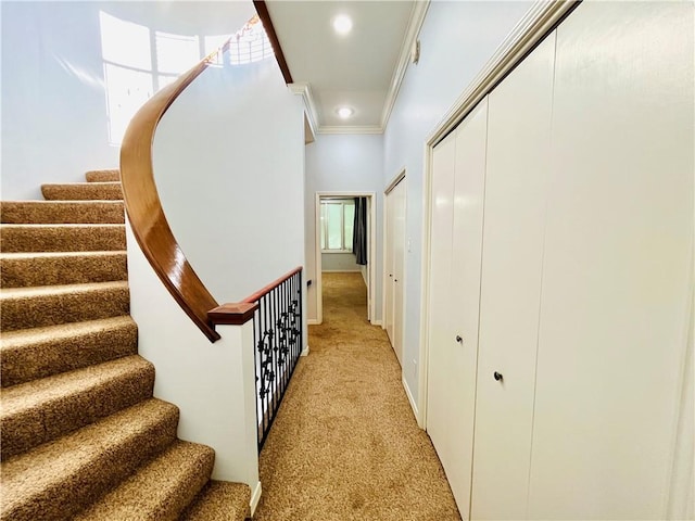 hall with light carpet, stairway, crown molding, and recessed lighting