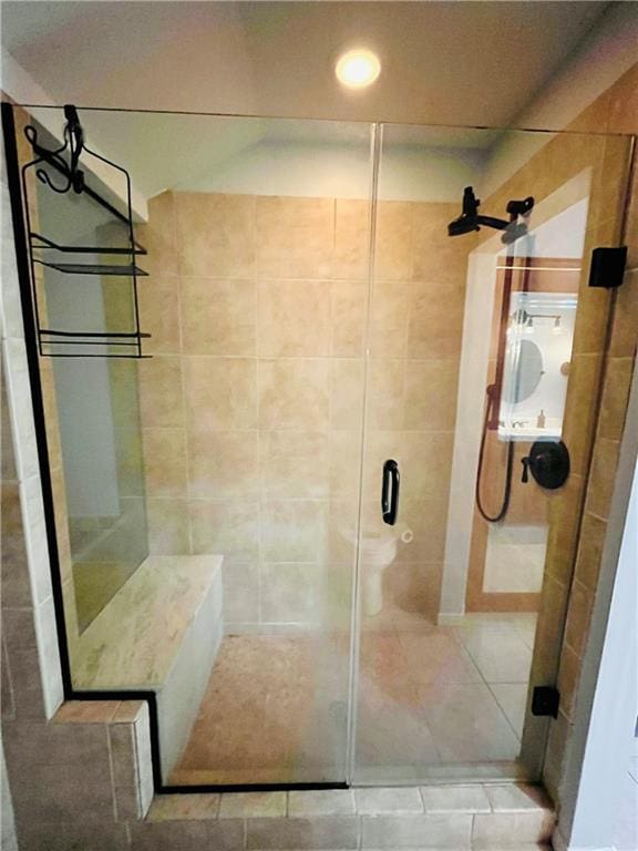 bathroom featuring a shower stall