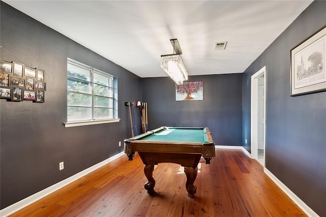 recreation room with pool table and hardwood / wood-style flooring