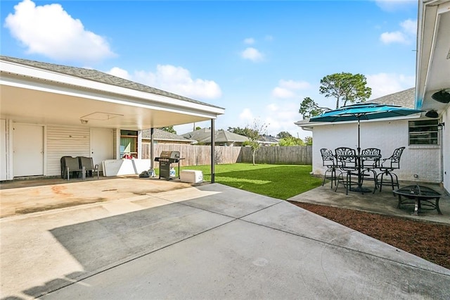 view of patio featuring a grill