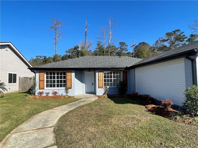 single story home with a front yard