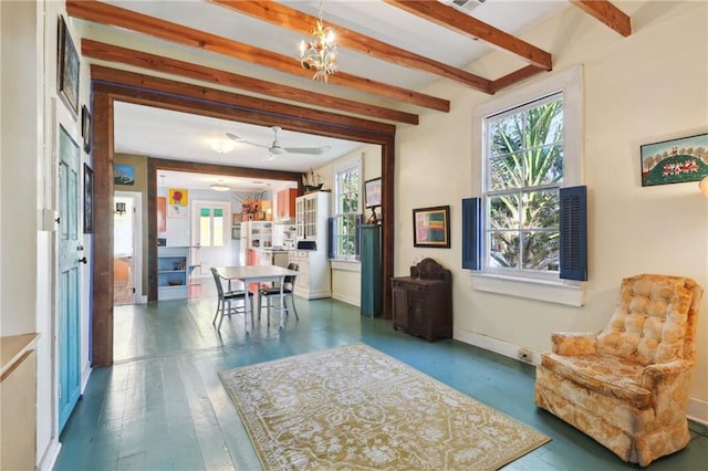 dining space with beamed ceiling, ceiling fan with notable chandelier, and dark hardwood / wood-style flooring