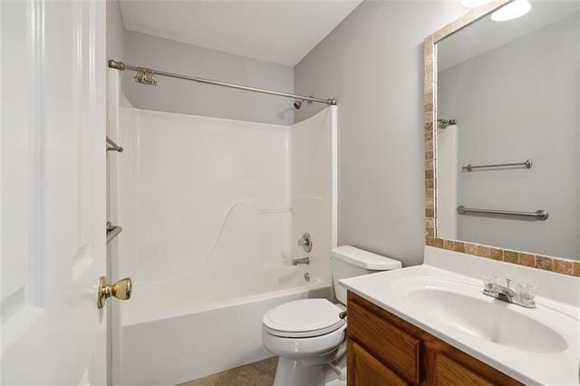 full bathroom featuring toilet, tub / shower combination, and vanity