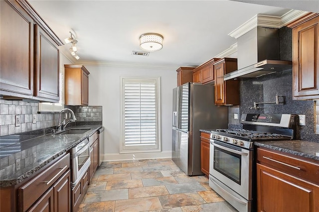 kitchen featuring wall chimney exhaust hood, stainless steel appliances, backsplash, ornamental molding, and sink