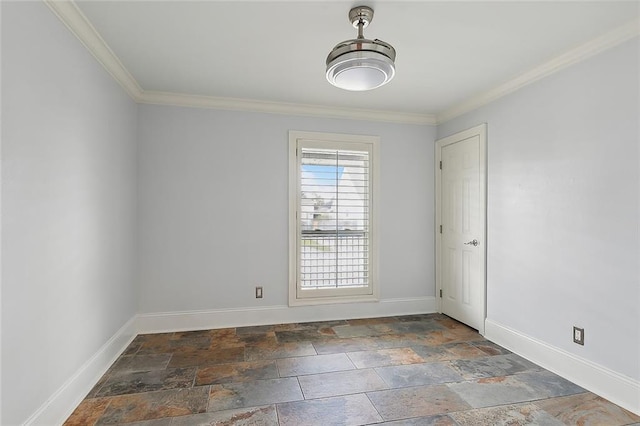 unfurnished room featuring crown molding