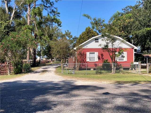 view of property exterior featuring a yard