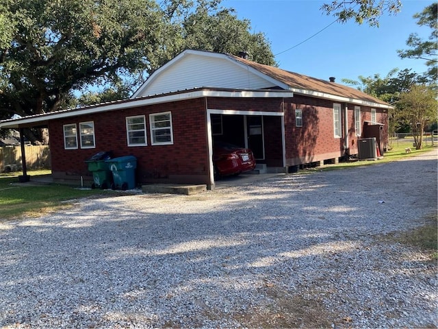 view of front of home with a carport