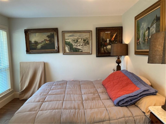 bedroom featuring hardwood / wood-style flooring