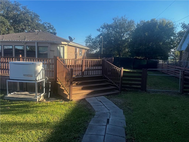 view of yard featuring a wooden deck