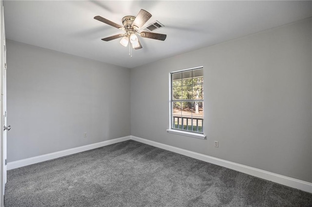 unfurnished room with carpet flooring and ceiling fan