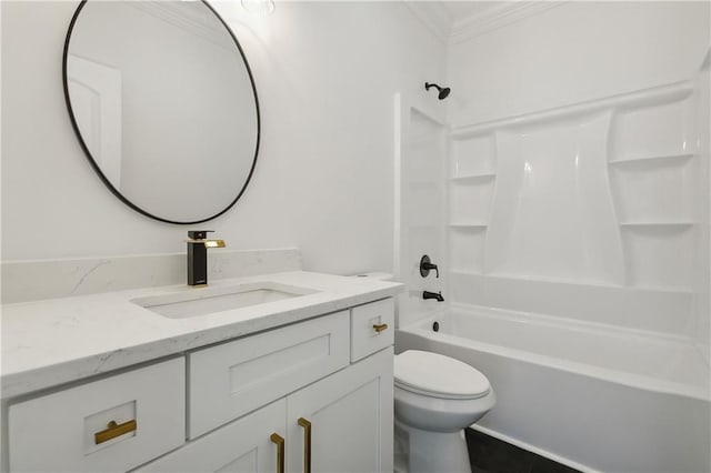 full bathroom with toilet, shower / washtub combination, vanity, and ornamental molding