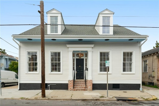 view of cape cod-style house