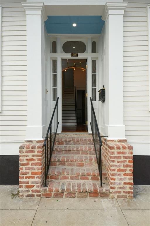 doorway to property with a porch