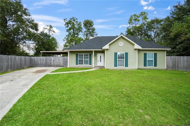 single story home featuring concrete driveway, fence, a shingled roof, and a front lawn