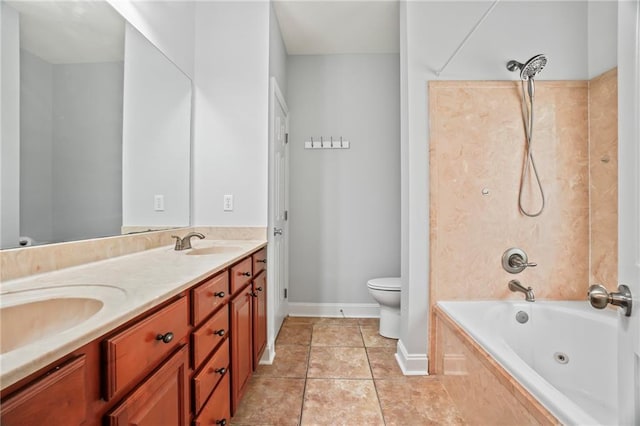 bathroom with a sink, double vanity, toilet, a combined bath / shower with jetted tub, and baseboards