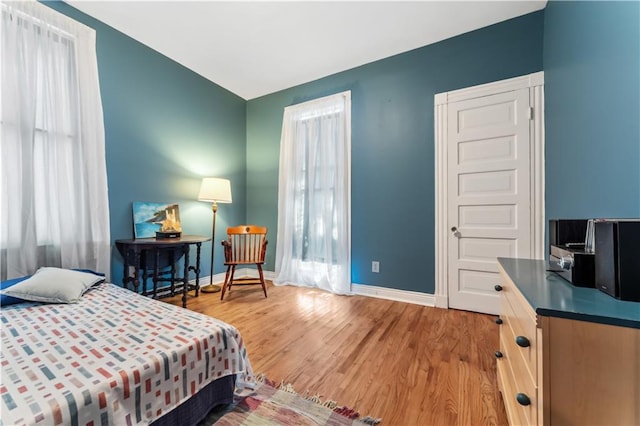 bedroom featuring light wood-type flooring