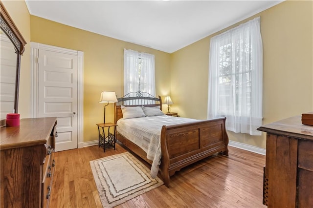 bedroom featuring light hardwood / wood-style floors