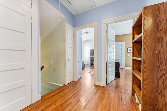 corridor featuring light hardwood / wood-style flooring