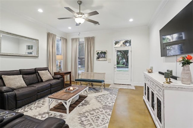 living room with crown molding and ceiling fan