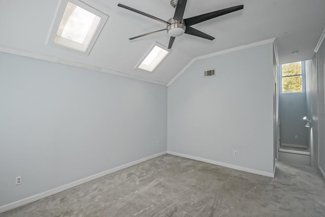 bonus room featuring ceiling fan, light colored carpet, and vaulted ceiling