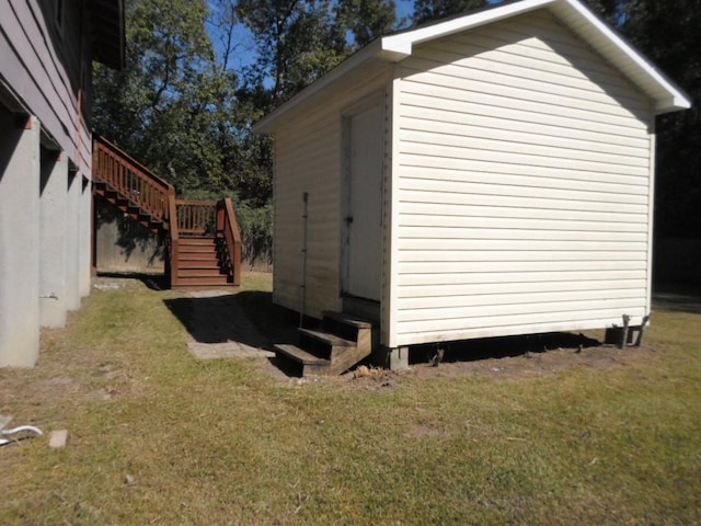 view of home's exterior with a lawn