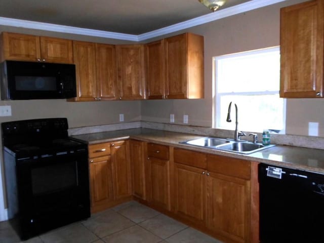 kitchen featuring ornamental molding, black appliances, sink, and light tile patterned floors