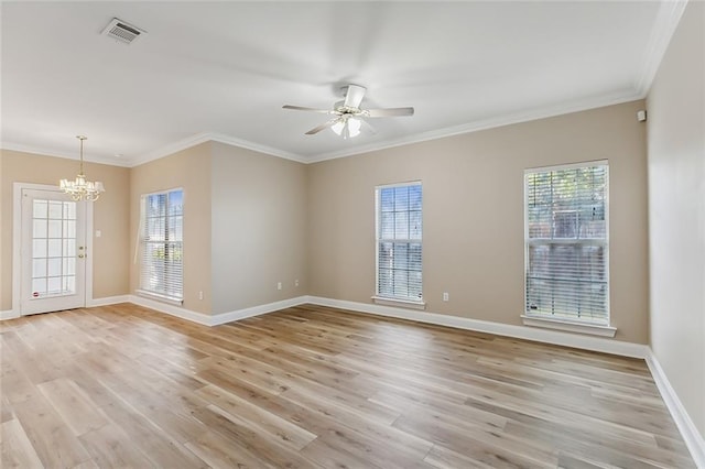 unfurnished room featuring a wealth of natural light and light wood-type flooring