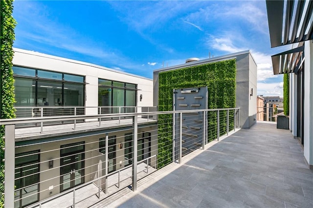917 Conti St Unit 205, New Orleans, LA 70112 - view of patio with a balcony