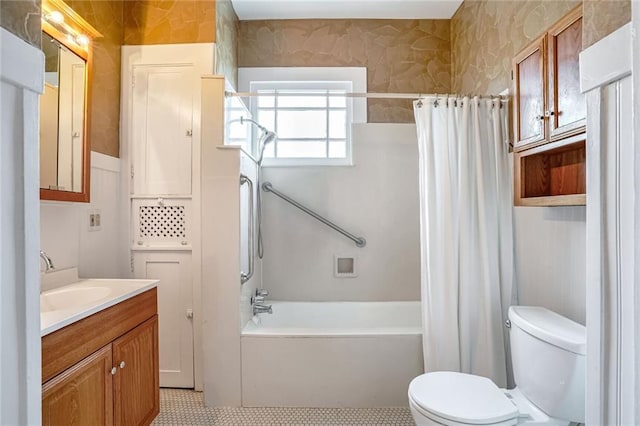 full bathroom with vanity, toilet, and shower / bath combo with shower curtain