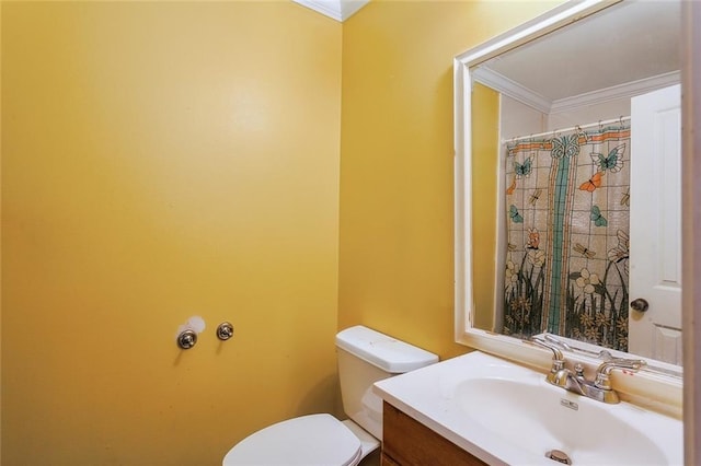 full bath featuring toilet, ornamental molding, and vanity