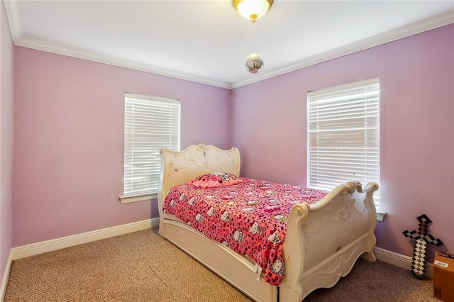 carpeted bedroom with crown molding and baseboards