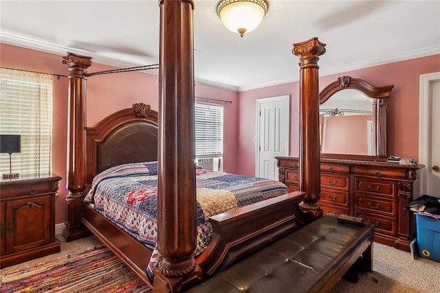 bedroom with light carpet, decorative columns, and crown molding