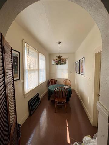 dining area with dark hardwood / wood-style floors