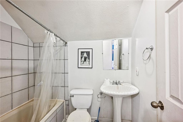 full bathroom featuring toilet, sink, vaulted ceiling, a textured ceiling, and shower / bathtub combination with curtain