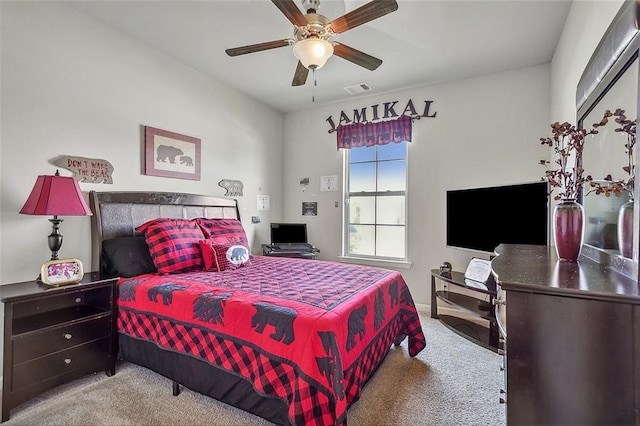 bedroom featuring ceiling fan and light colored carpet