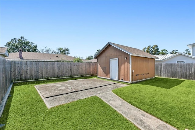 view of outbuilding with a yard