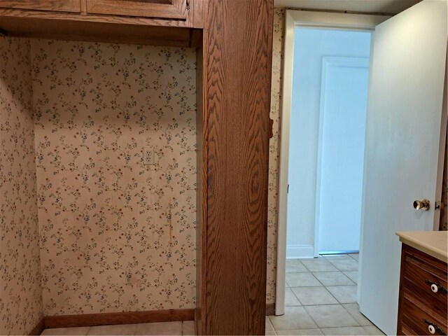 bathroom featuring vanity and tile patterned flooring