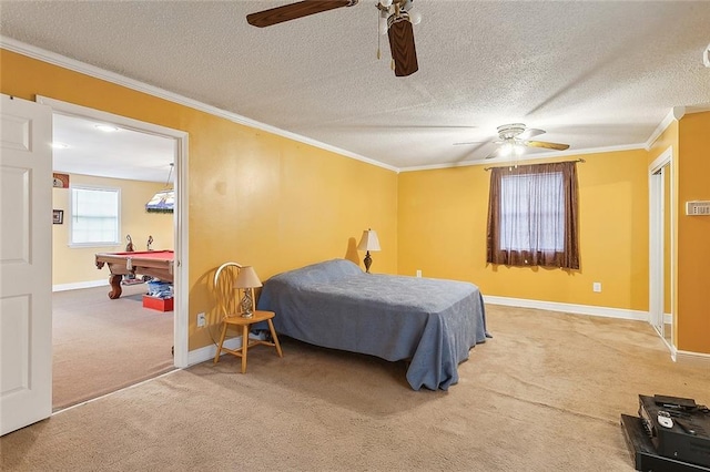 carpeted bedroom with ornamental molding, pool table, a textured ceiling, and ceiling fan