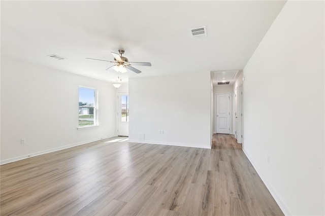 unfurnished room featuring light hardwood / wood-style flooring and ceiling fan