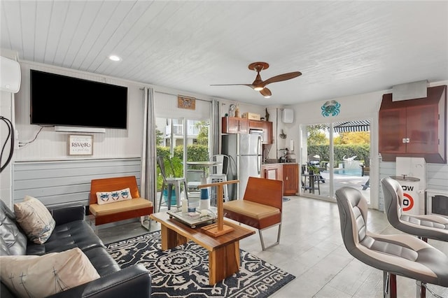 living room with ceiling fan