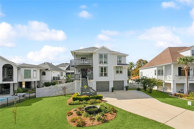 view of front of house with a garage and a front lawn