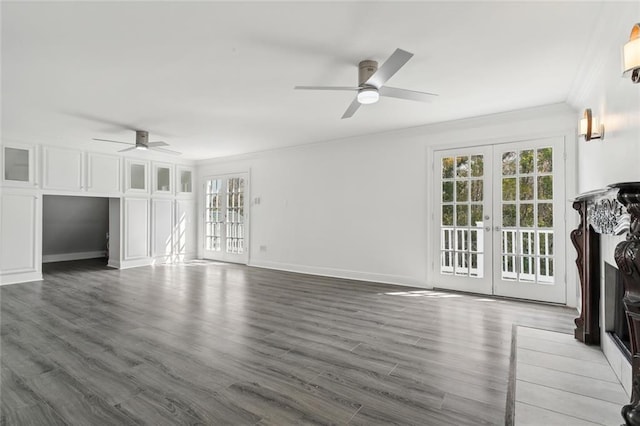 unfurnished living room with ceiling fan, french doors, crown molding, and plenty of natural light