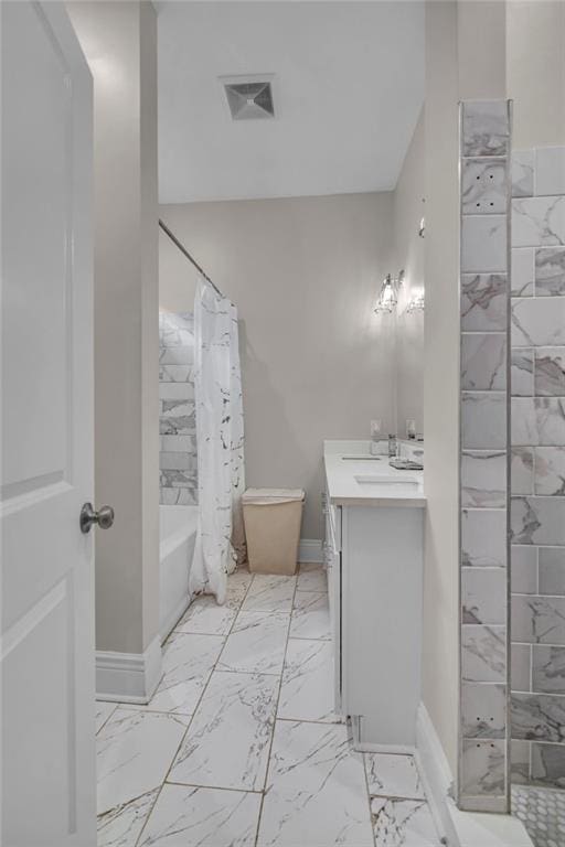 full bathroom featuring vanity, shower / bath combo, and toilet